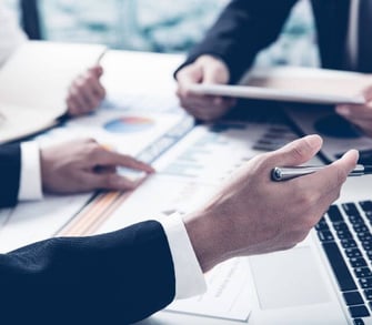 photo-sliver-business-adviser-analyzing-financial-figures